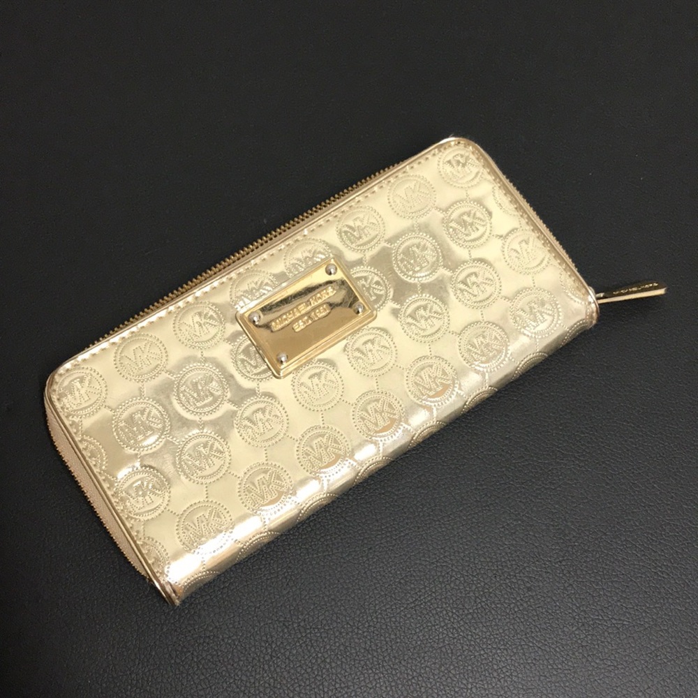 Michael Kors metallic gold zip wallet